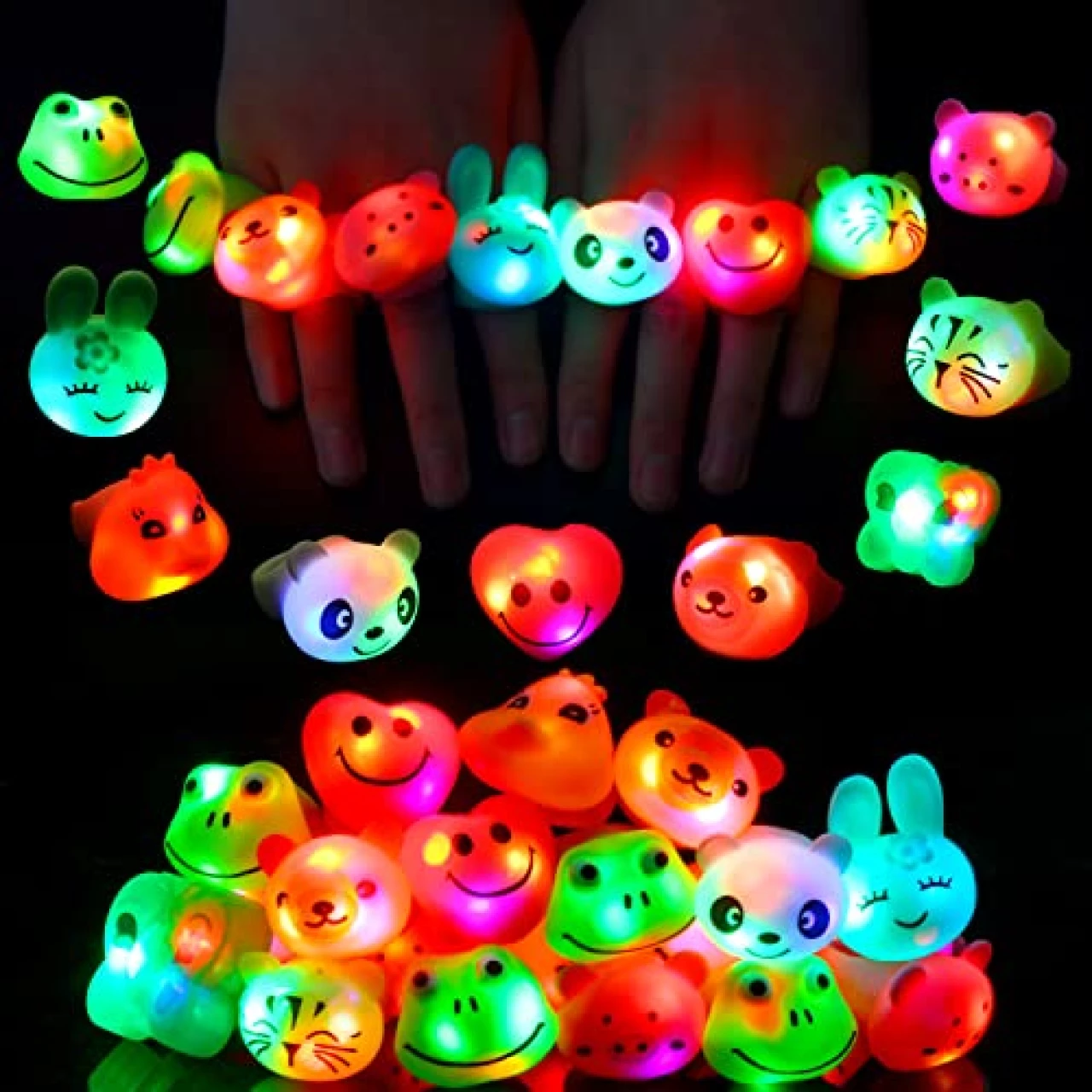 CCINEE 24Pcs Light Up Rings Flashing Colorful LED Animal Rubber Bumpy Jelly Rings Glow in Dark Finger Toys